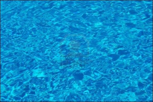 Water Textureswimmig-pool-blue-cold-water-texture-with-ripple-to-use-as-background